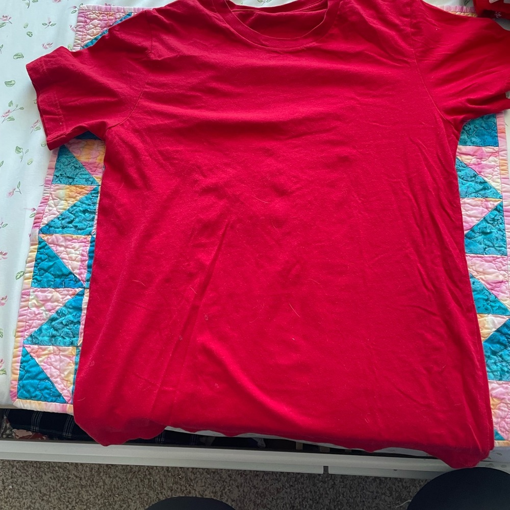 Red basic tee barley worn